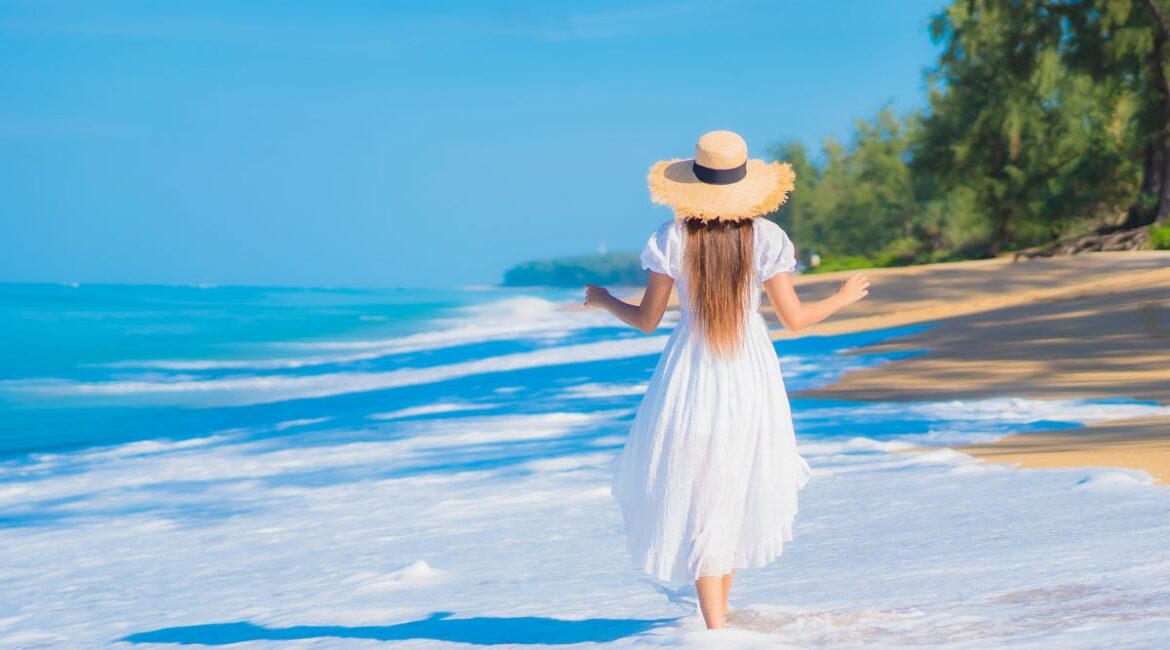 A woman walking on the beach