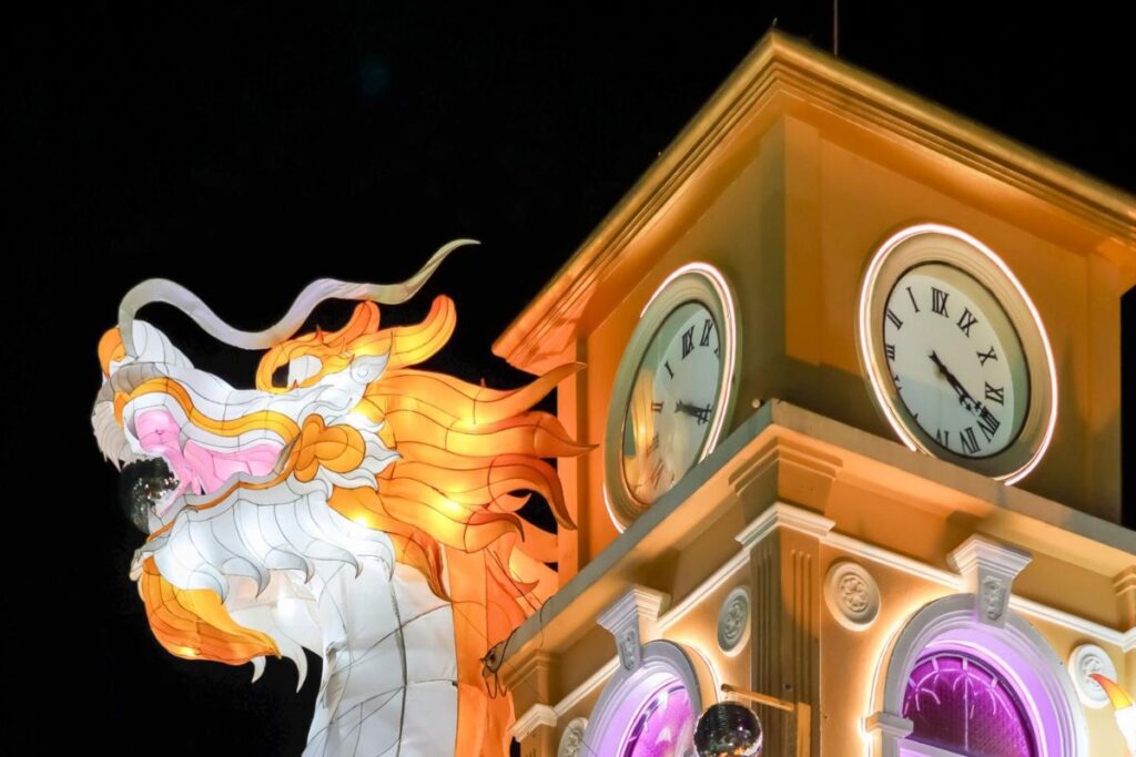 Clock tower with big white dragon