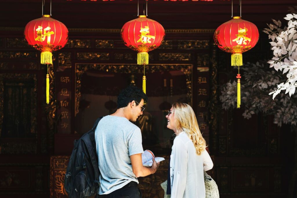 Tourist couple in Chinese shrine