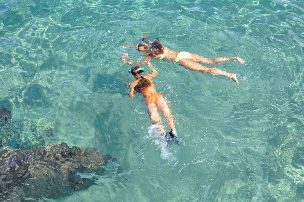 2 girls snorkeling
